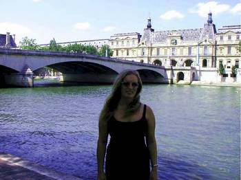 Barbara on the Seine, Louvre int he background.