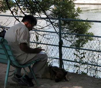 Man and dog relax on the Isle.