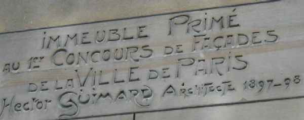 Engraved stone indicating the facade won first prize in Paris.